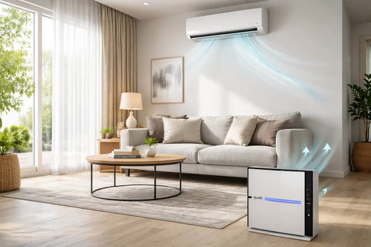 Air purifier on the floor below a wall mounted heat pump in a modern NZ living room