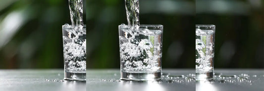 Under-bench water purifier system in a modern NZ kitchen with a dedicated drinking water tap