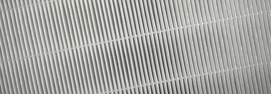 Modern air purifier with HEPA filtration in a bright New Zealand living room.